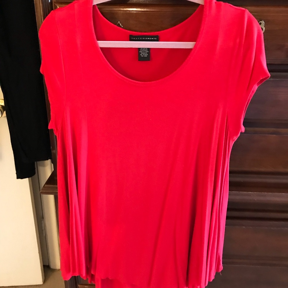 Cute red tunic top.this is like a swing piko top.